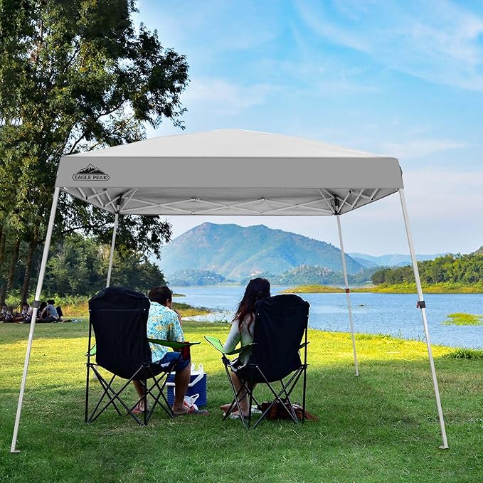 EAGLE PEAK 10x10 Slant Leg Outside Pop Up Canopy, Instant Outdoor Canopy Tent, 8x8 Top 10x10 Base Sun Shelter with Wheeled Carry Bag, Ropes and Stakes, White